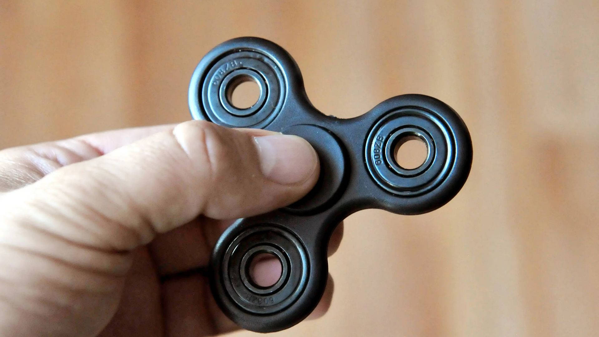 Soothing Black Fidget Toy Background