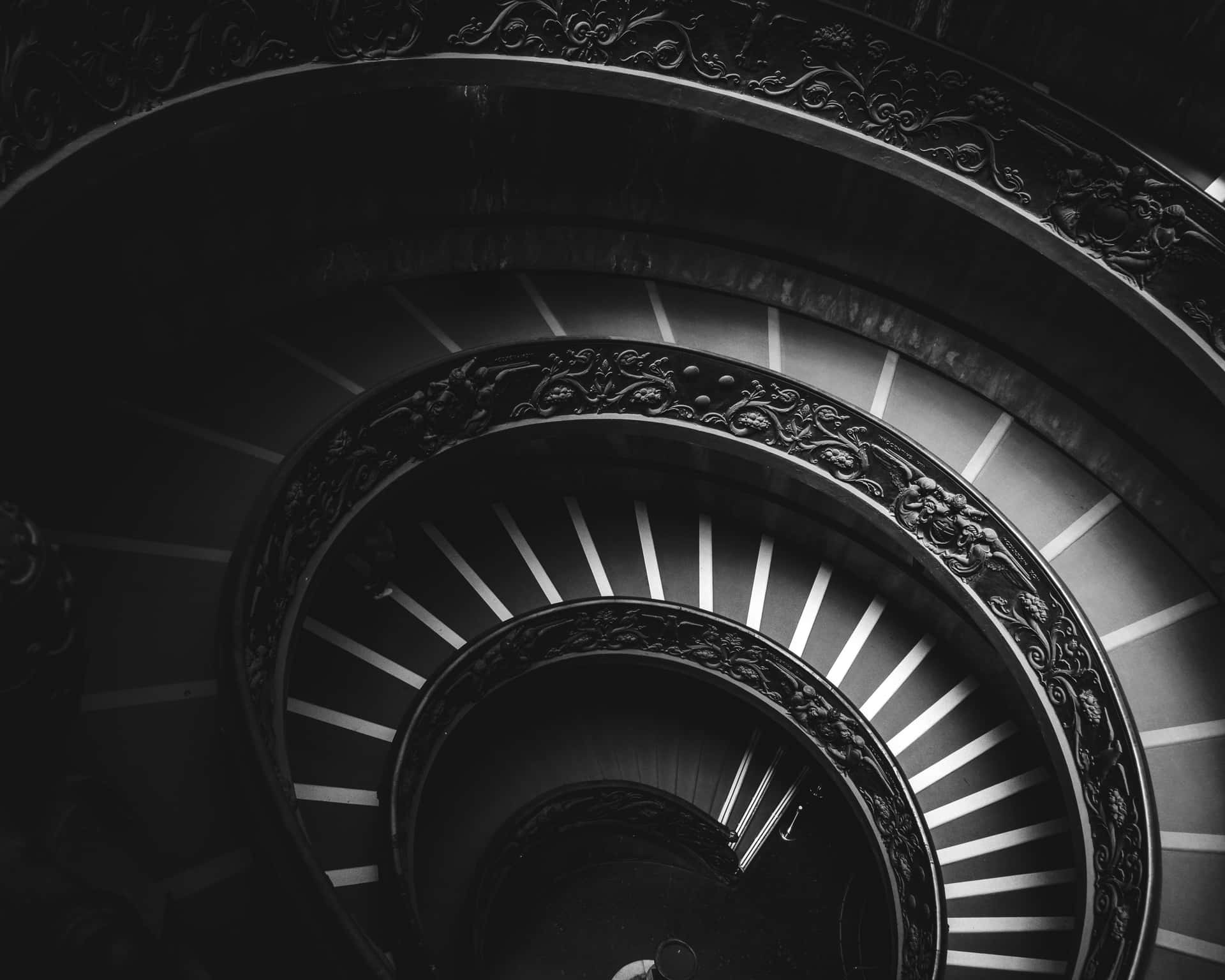Sophisticated Monochrome Spiral Staircase Background