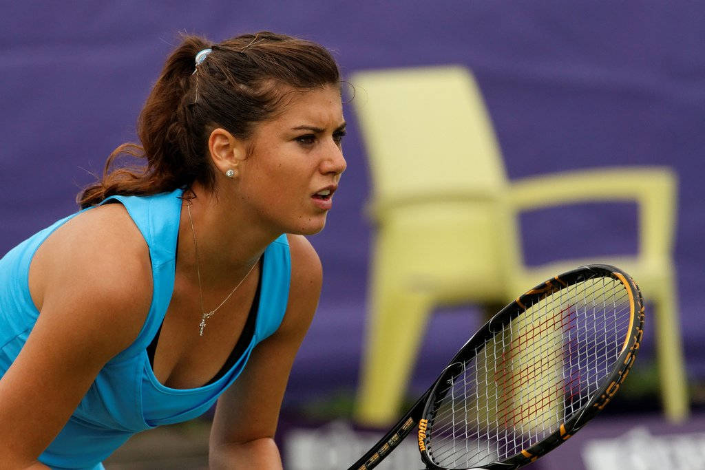 Sorana Cirstea Intensely Concentrating During A Match Background