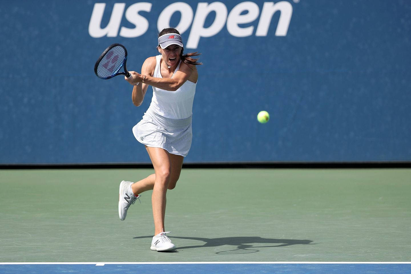 Sorana Cirstea Running For Ball Background