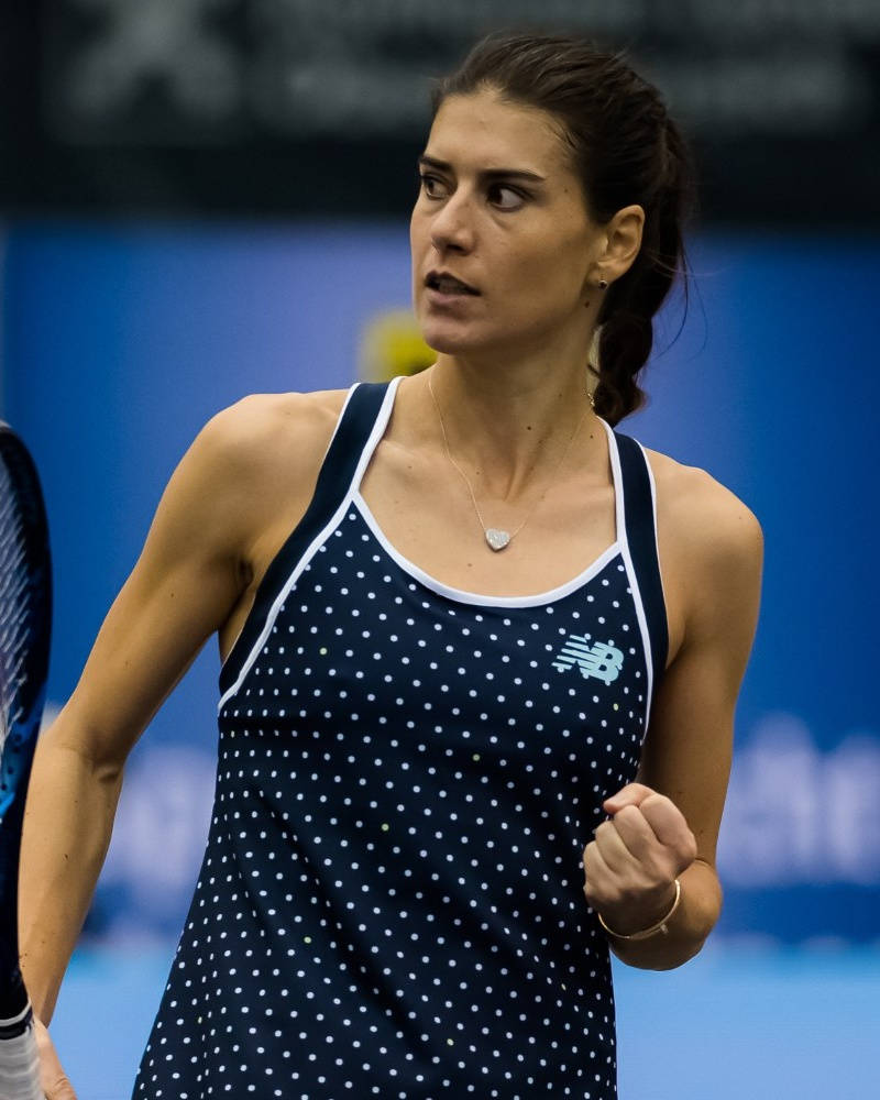 Sorana Cirstea With Clenched Fist Background