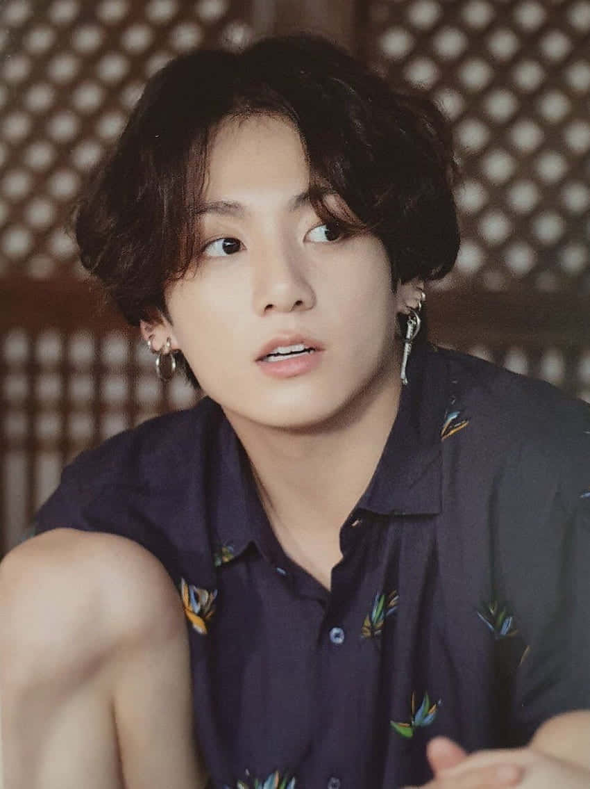South Korean Pop Star Bts Jungkook With Long Hair Background