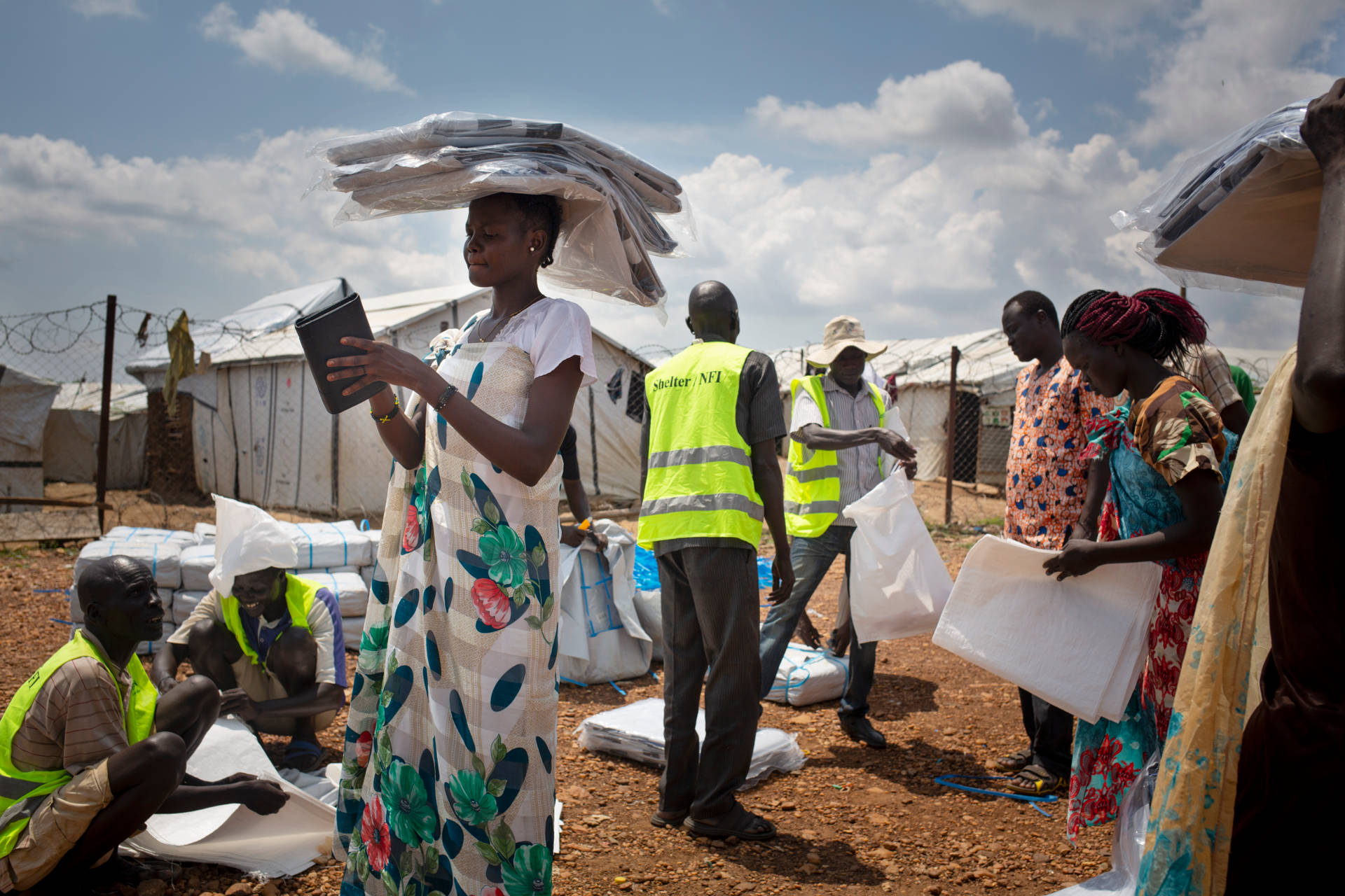 South Sudan Distribution Women Clouds Background