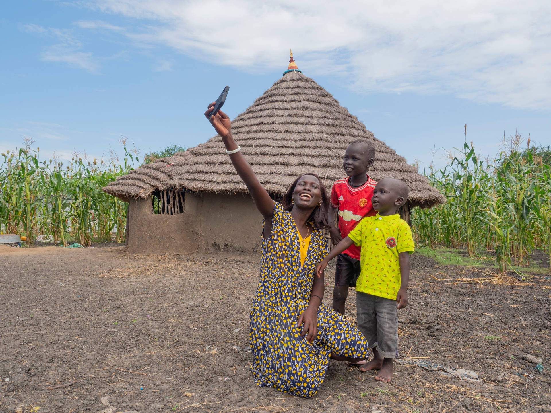 South Sudan Family Selfie House Background