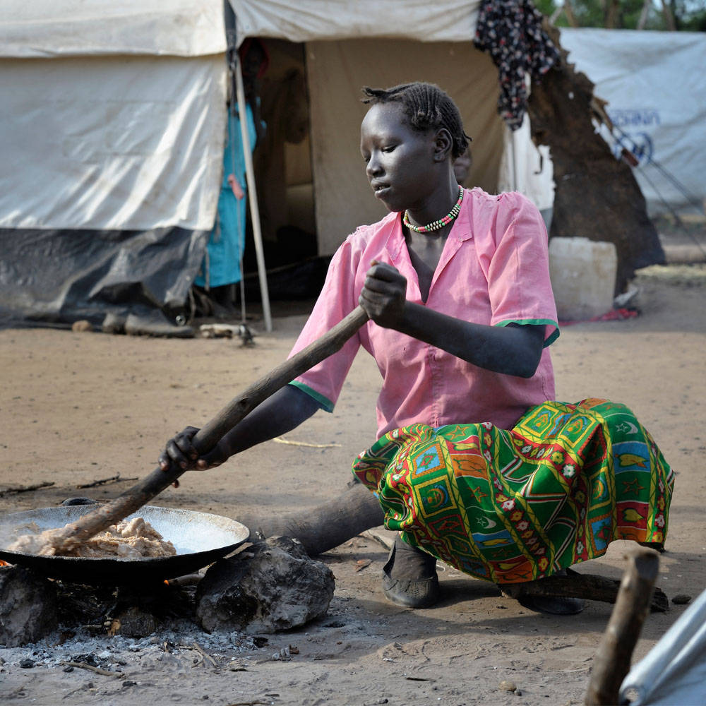 South Sudan Pink Shirt Cooking Background