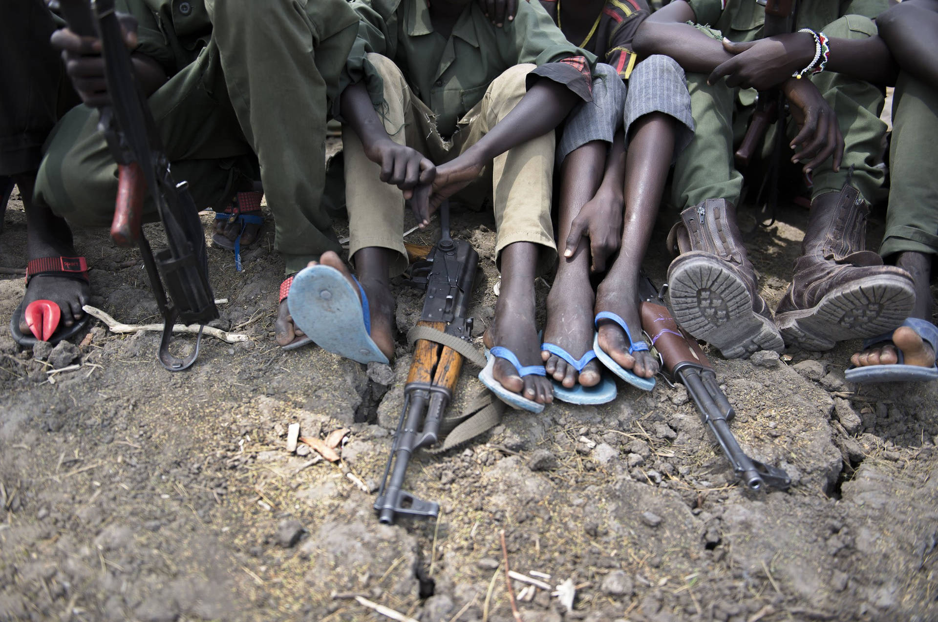 South Sudan Soldiers Legs Guns Background