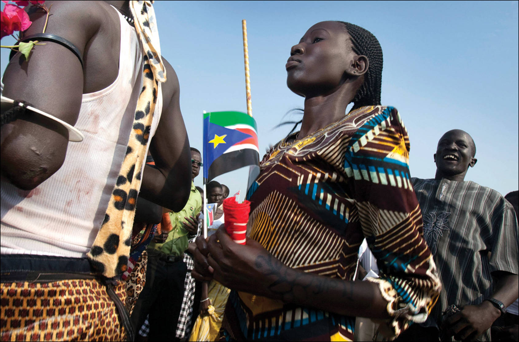 South Sudan Woman Holding Flag