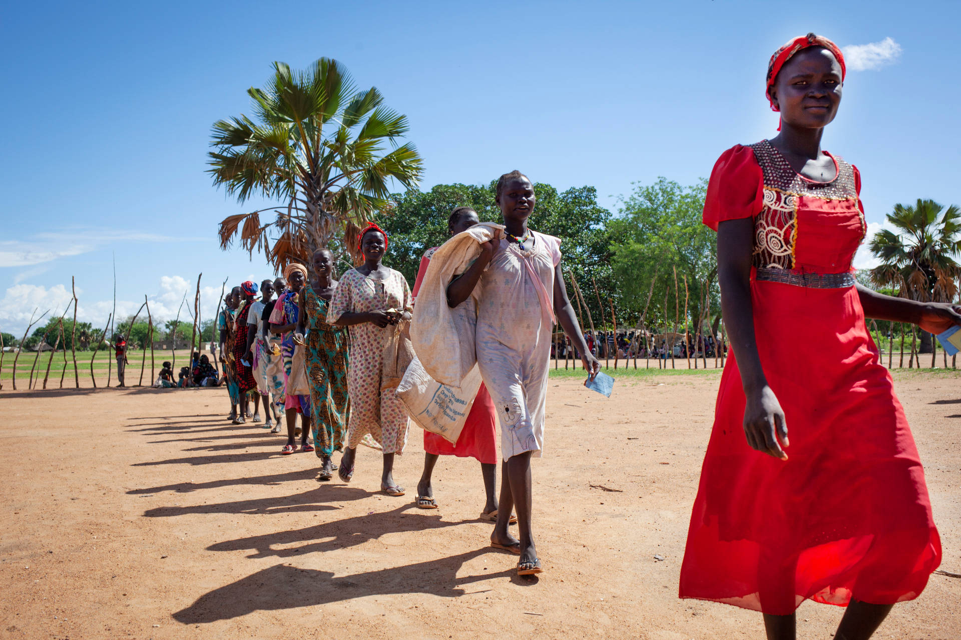 South Sudan Women Dresses Walking Background