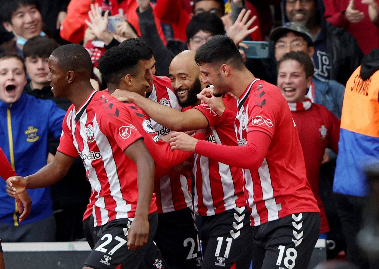 Southampton Fc Players Hugging Background