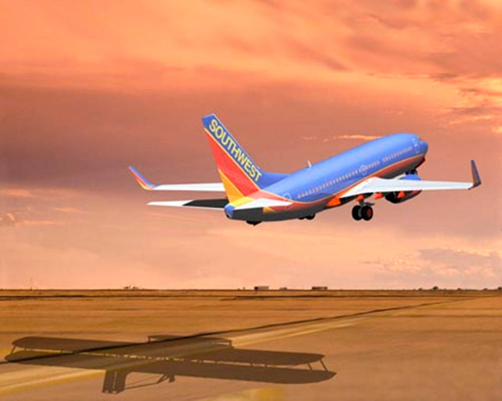 Southwest Airlines Plane Taking Off Background