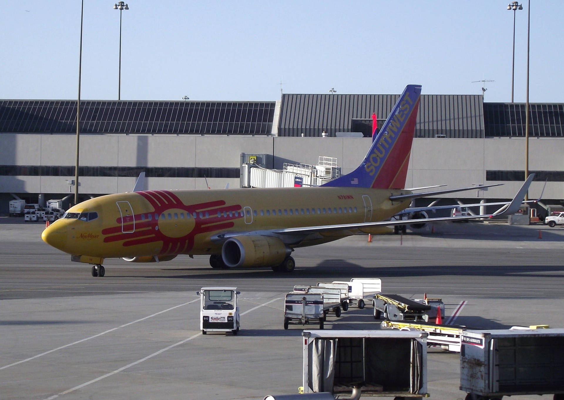 Southwest Airlines Yellow Airplane In Flight Background