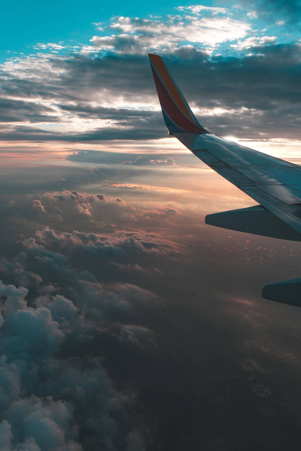 Southwest Airplane Above Dark Clouds Background