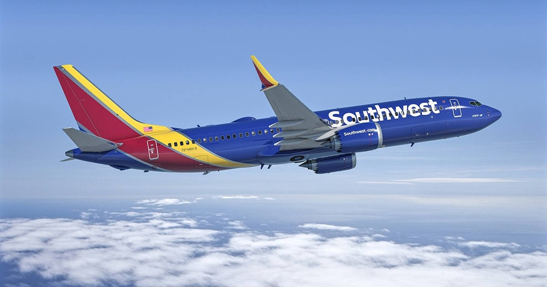 Southwest Airplane Soaring Above Clouds Background