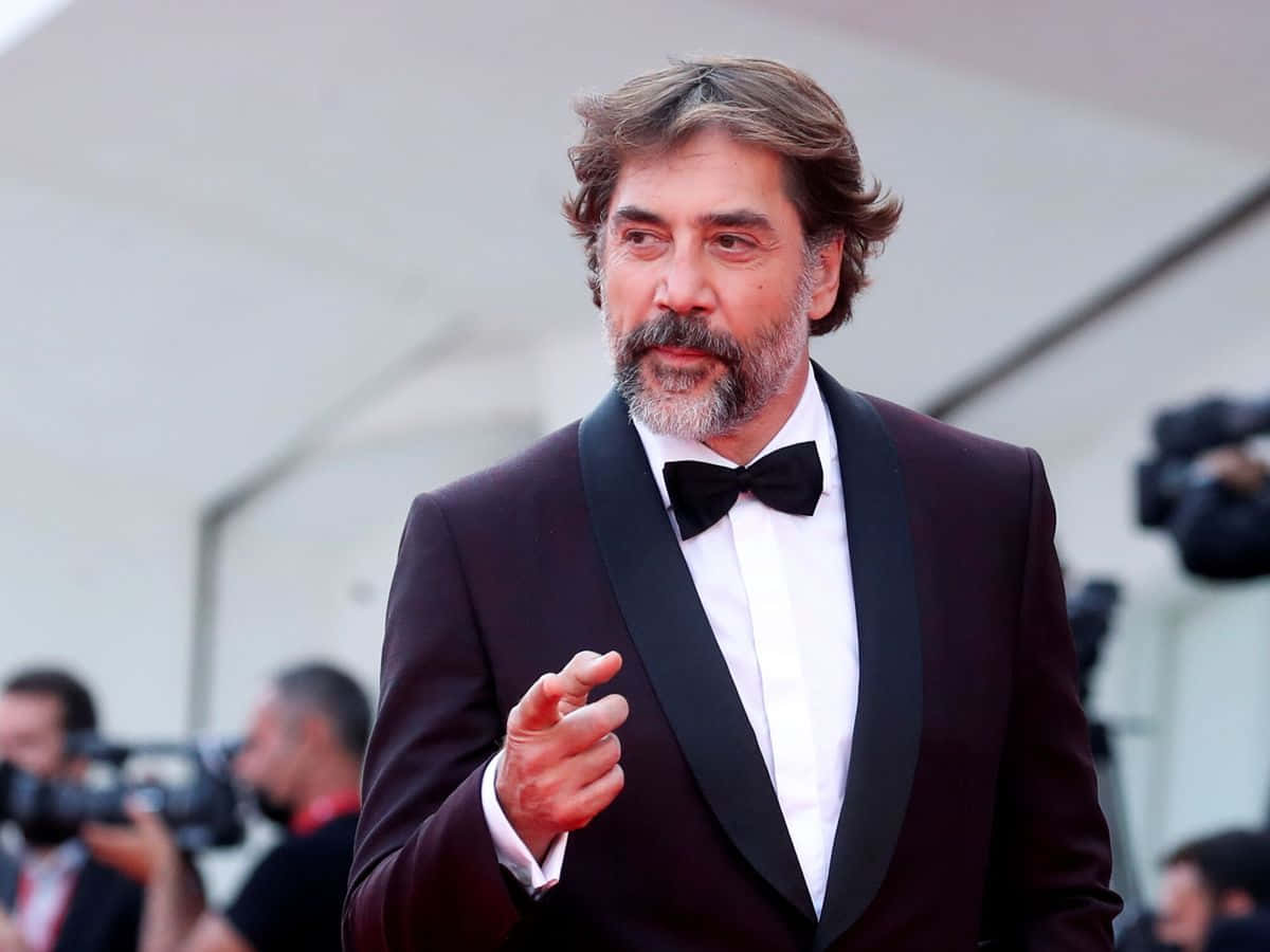 Spanish Actor Javier Bardem In A Candid Moment Background