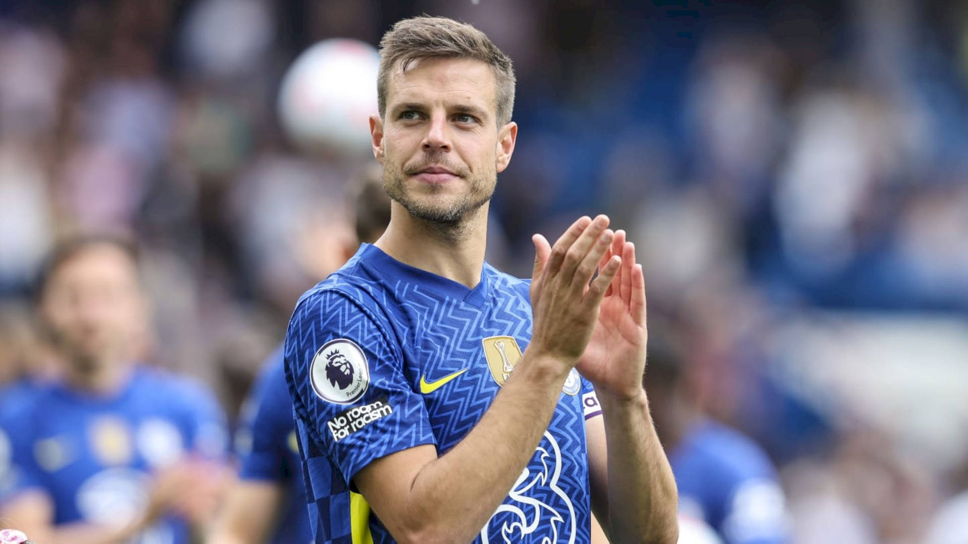 Spanish Professional Footballer, César Azpilicueta, Clad In Blue, Applauding On The Field