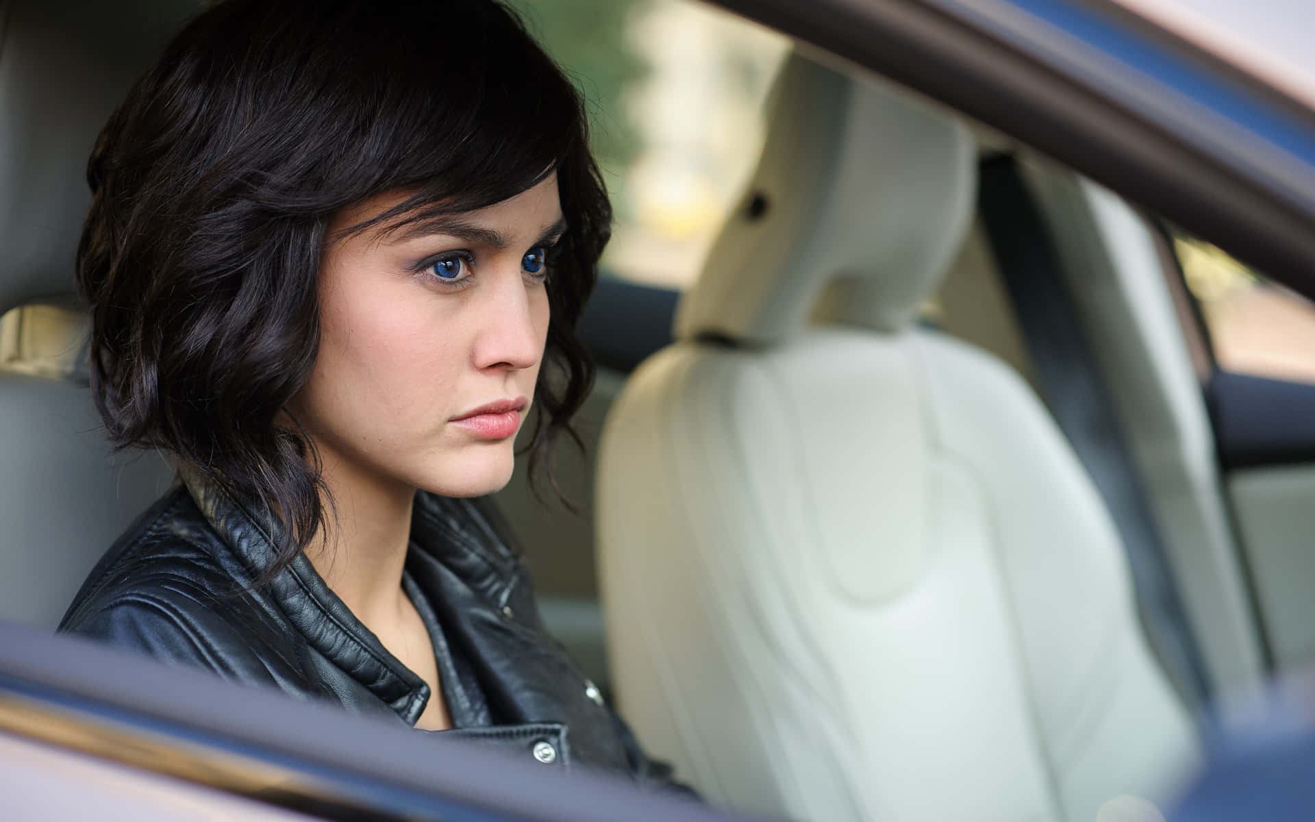 Spanish Woman Inside Car