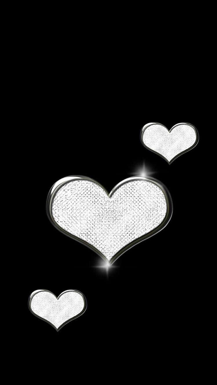 Sparkling Heartson Black Background Background