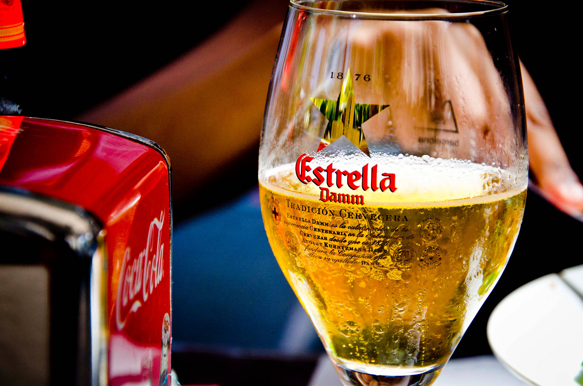 Sparkly Glass Of Estrella Damm Background