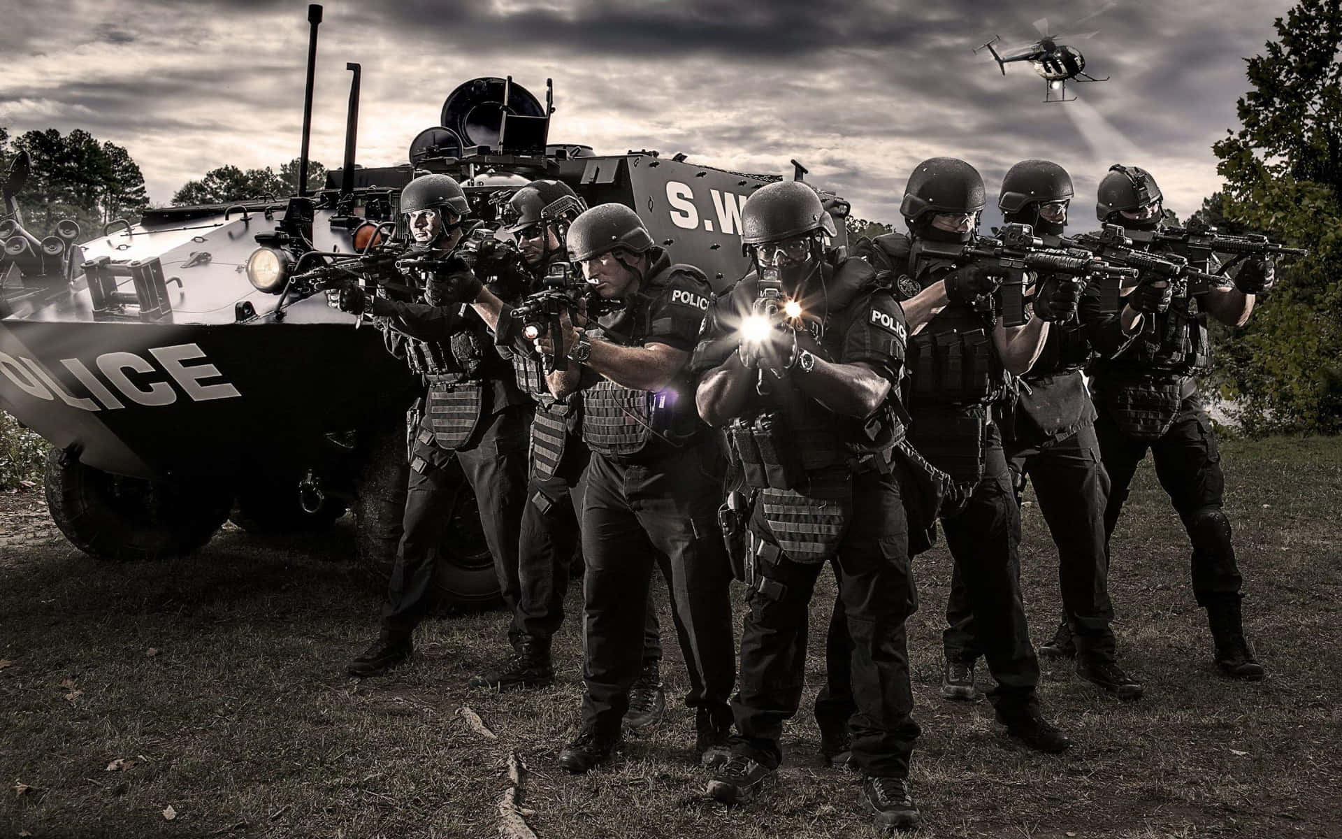 Special Weapons And Tactics (swat) Officers Stand Ready To Keep The Peace Background