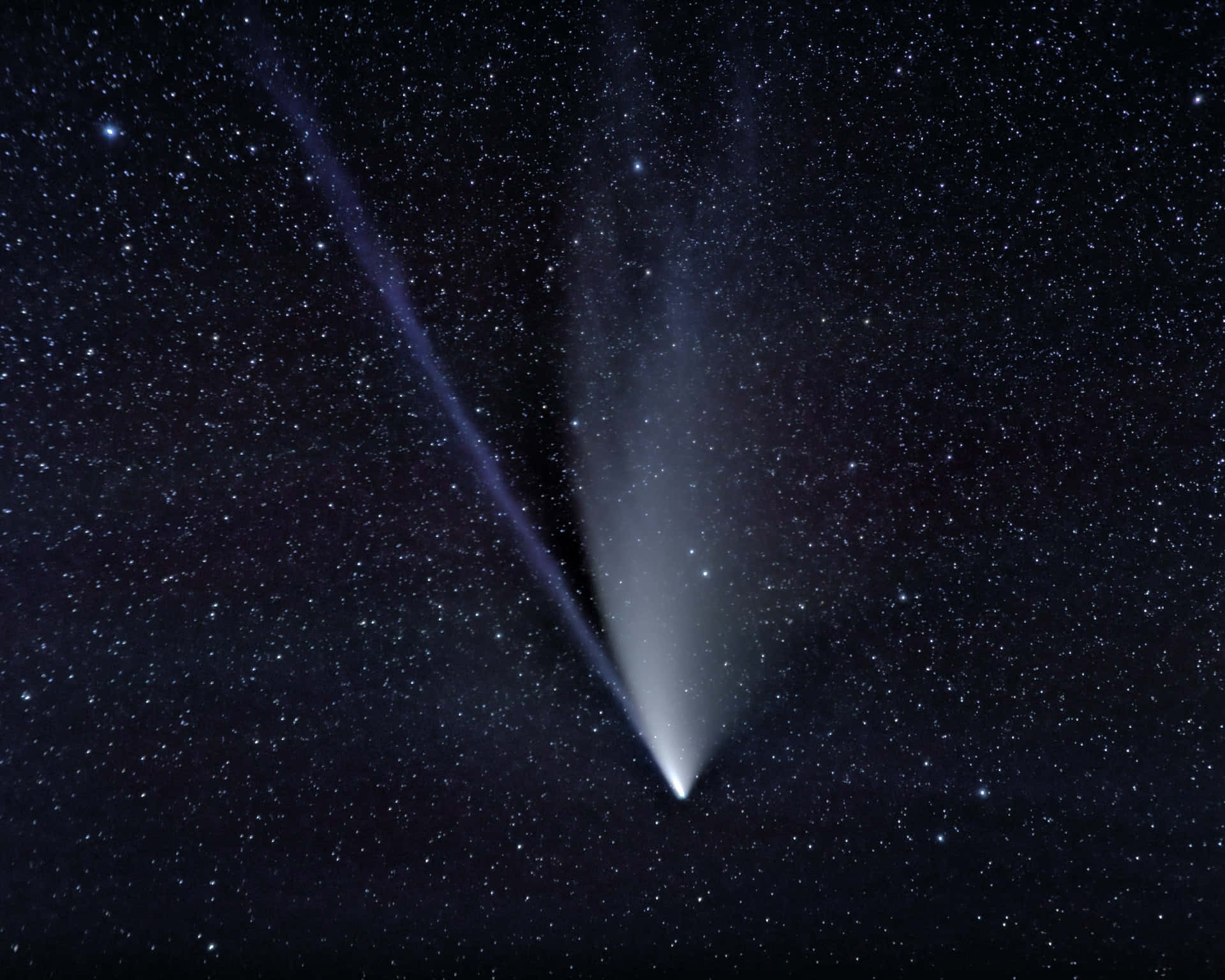 Spectacular Comet In Night Sky Background