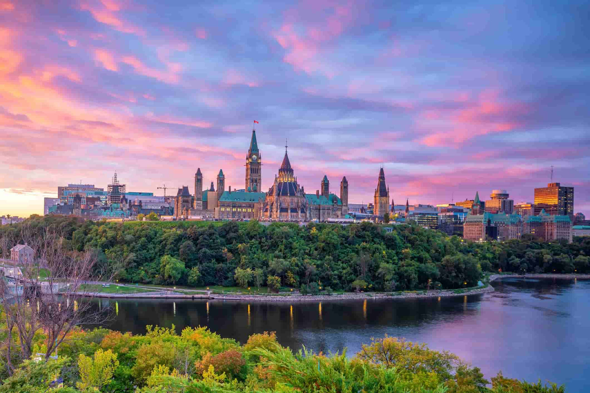 Spectacular Kaleidoscopic Sky Over Ottawa River Background