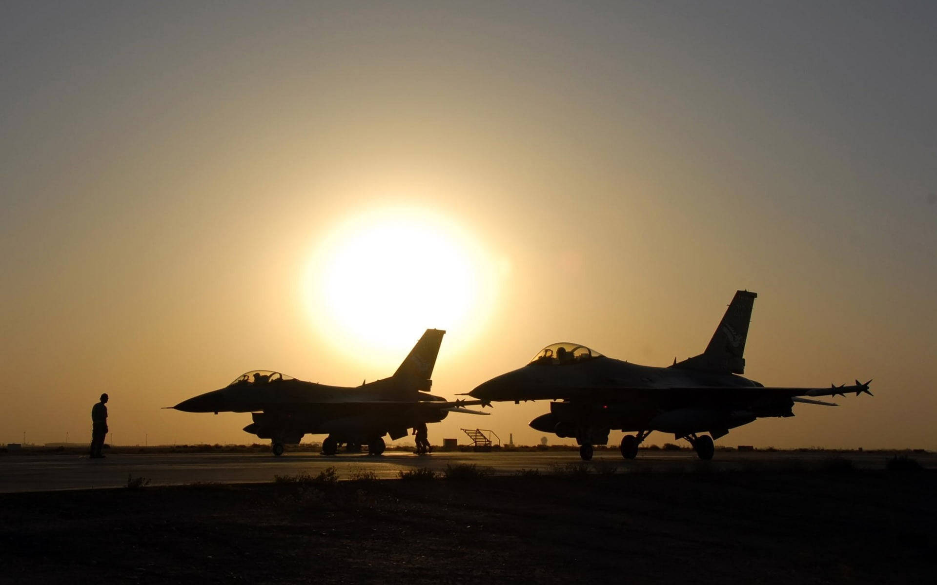 Spectacular Sunset Behind Falcon Military Aircraft Background