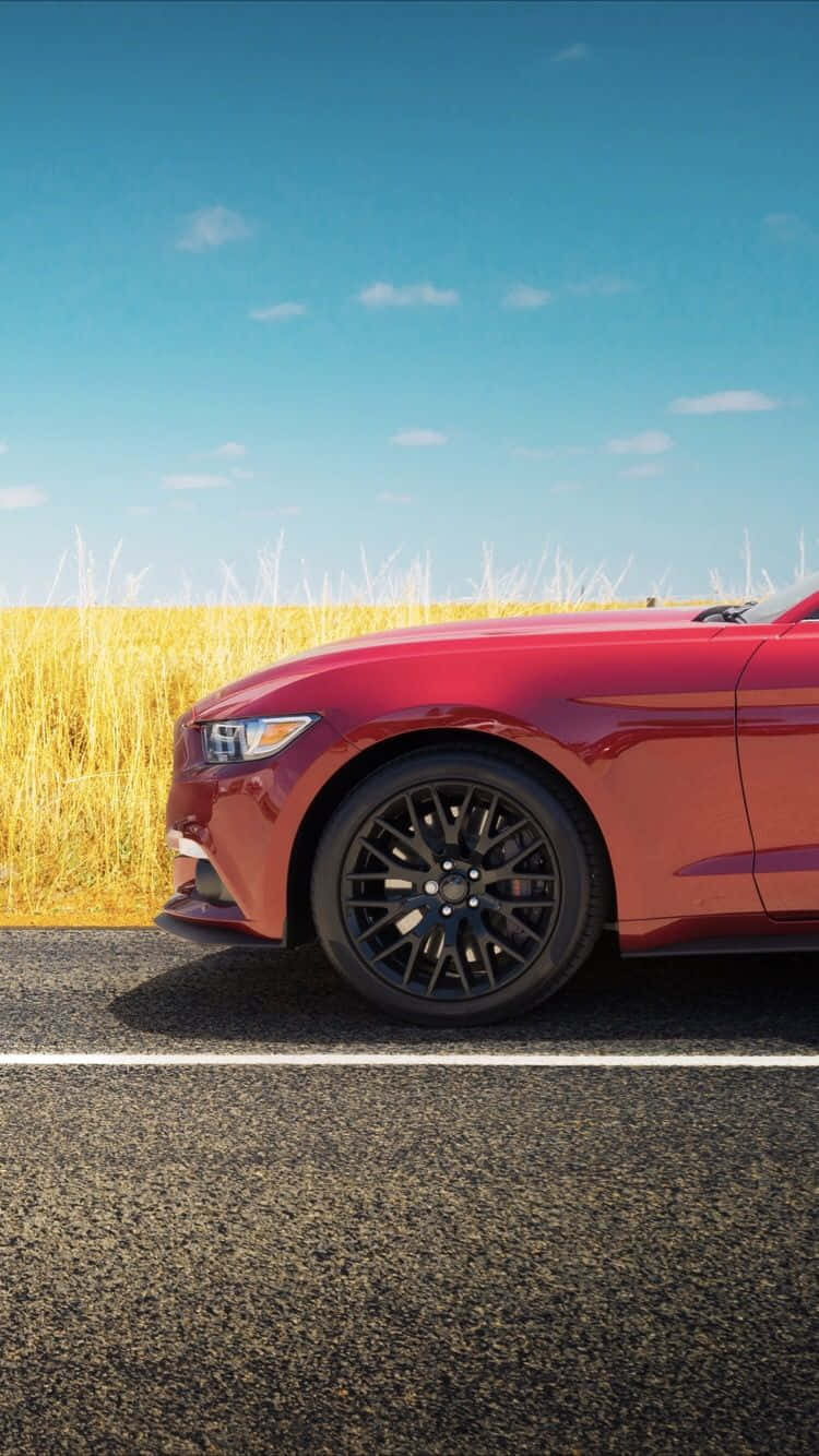 Speed Through The Day With A Red Car Iphone Background