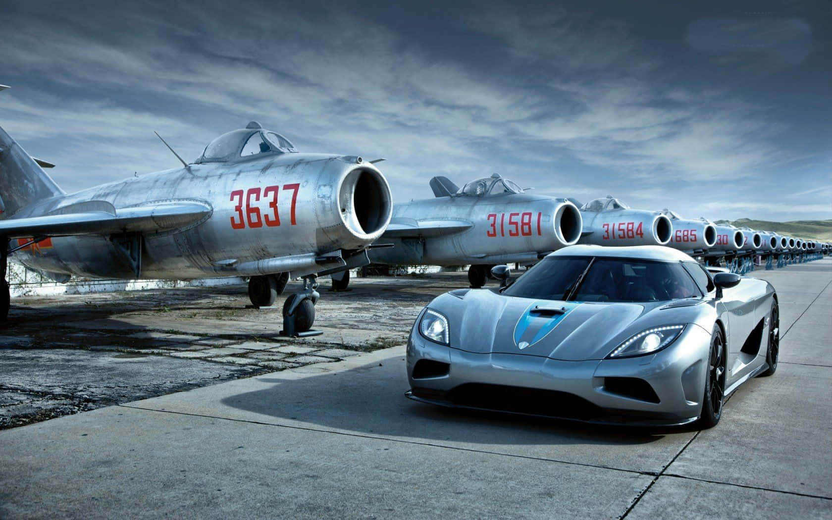 Speed Through The Skies And Roads With Jet And Car Background