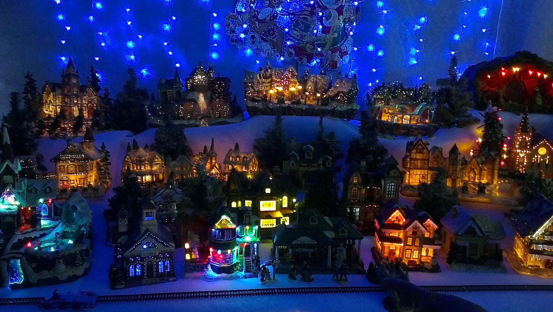 Spend Your Holidays In A Magical Christmas Village Background