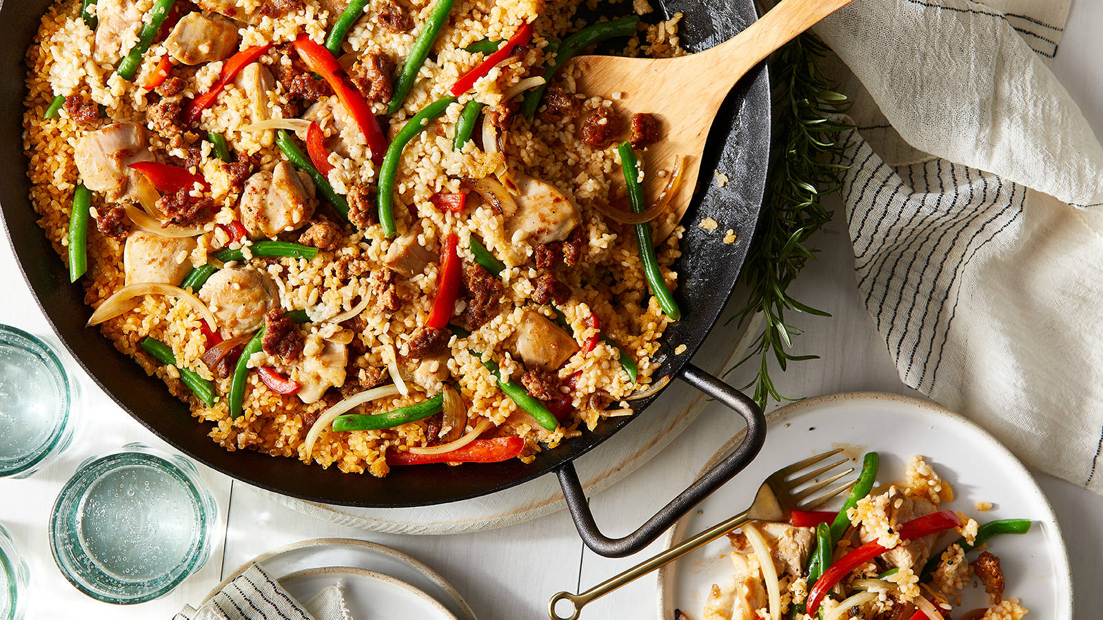 Spicy Paella With Red And Green Chili Peppers Background