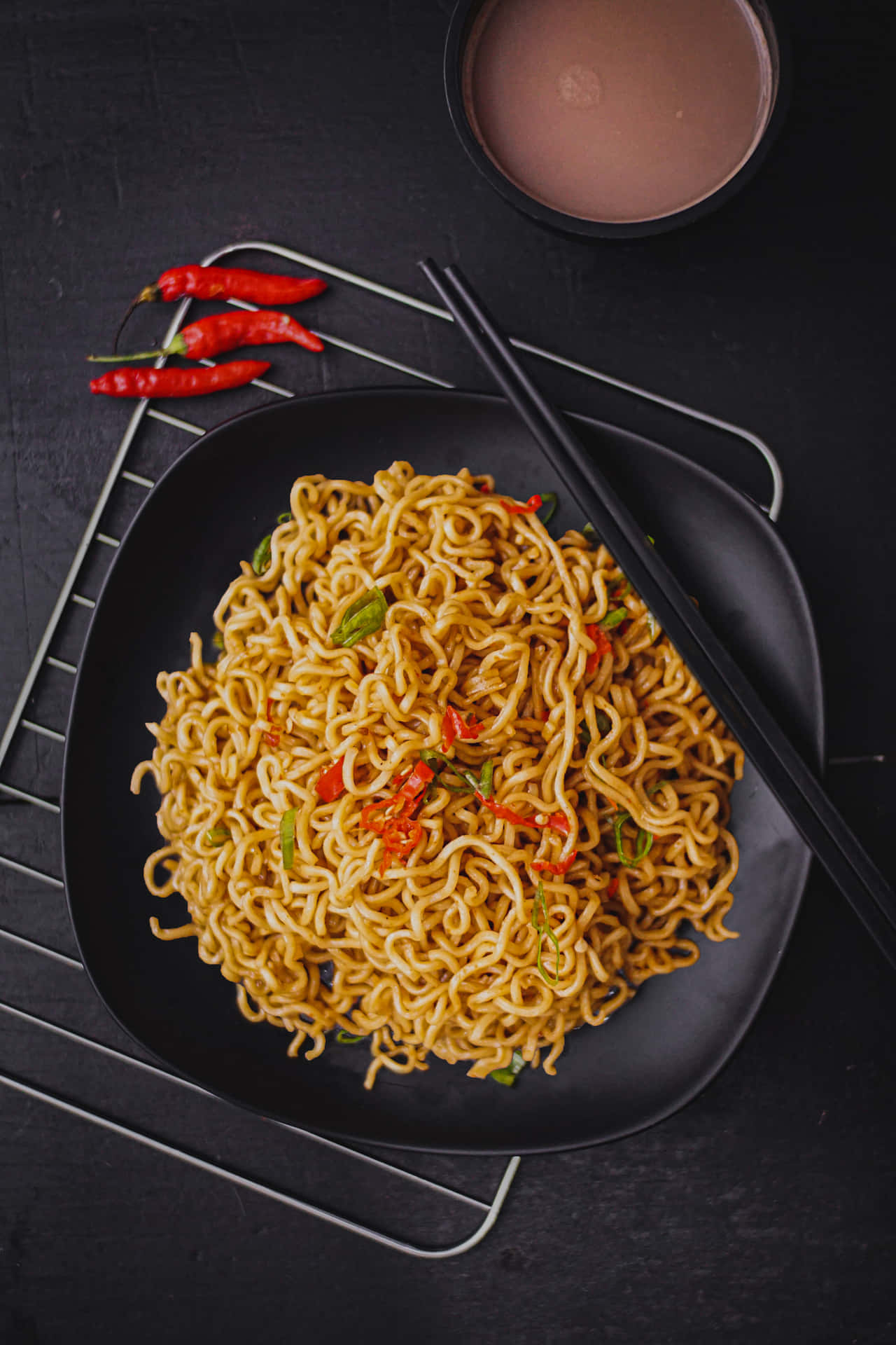 Spicy Schezwan Vegetable Noodles With Sauce Background