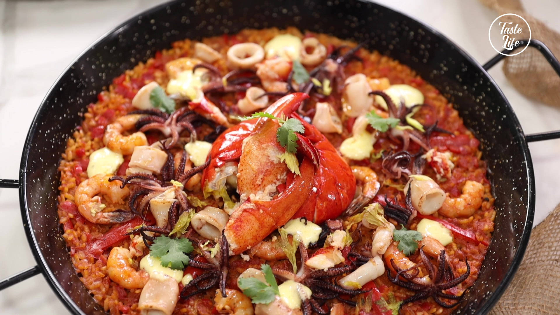 Spicy Seafood Paella With Crab Legs Background