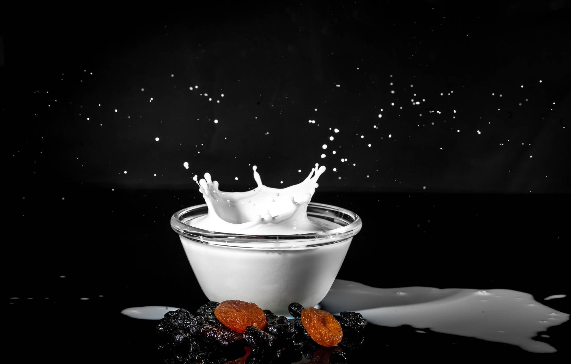 Spilt Milk Splash Captured In Glass Bowl Background