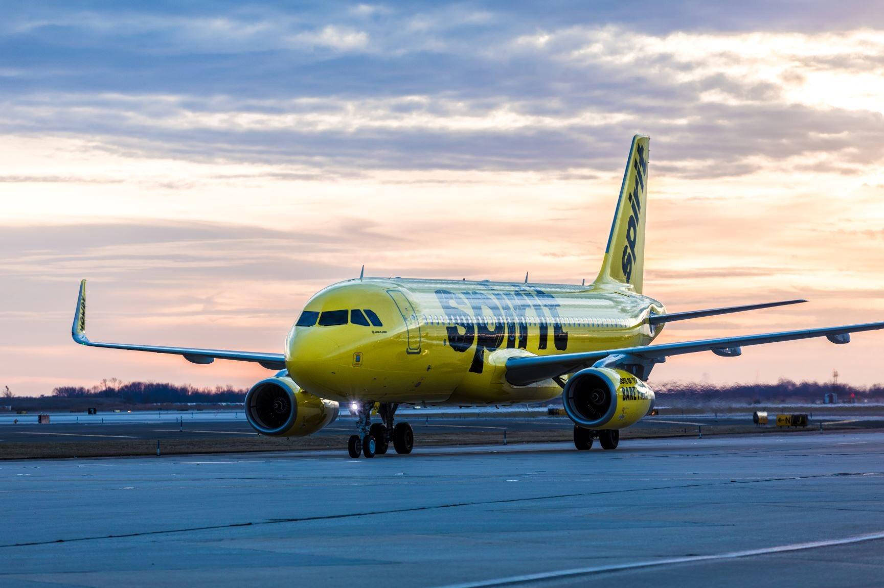 Spirit Airlines Airplane On Runway Background