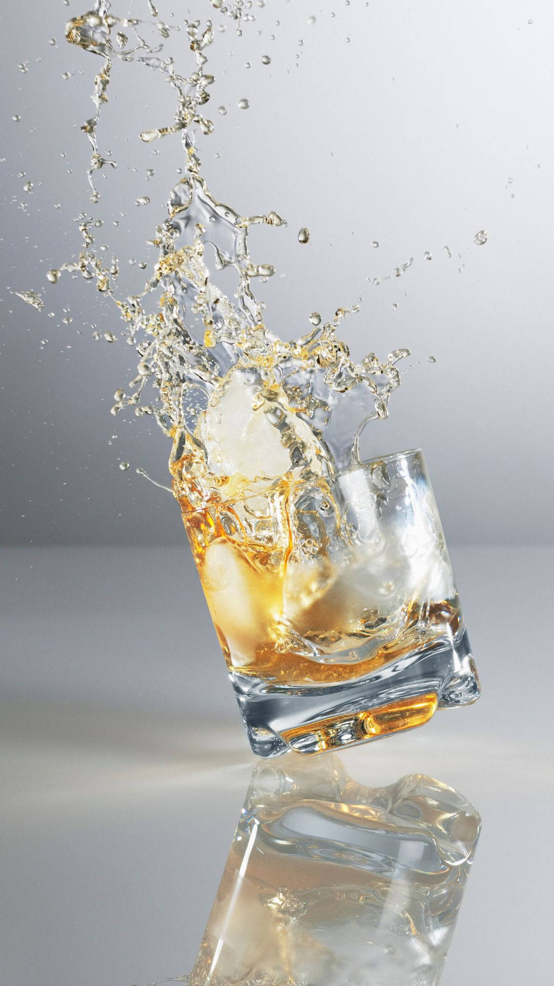 Splash Of Alcohol In Shot Glass Background