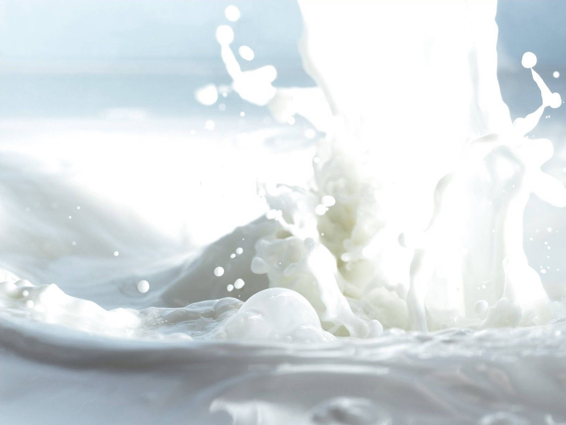 Splashing White Milk Liquid With Droplets