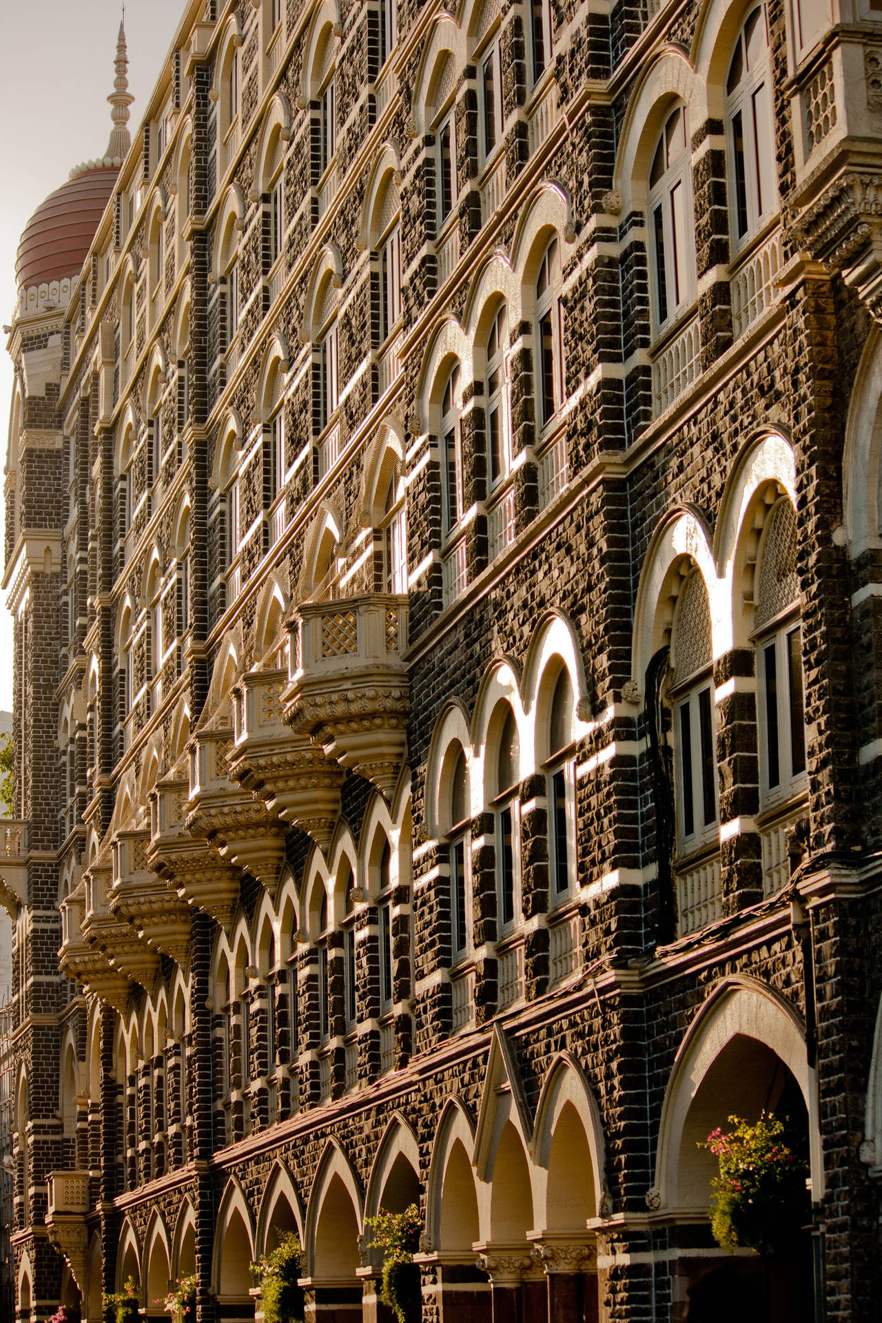 Splendid Facade Of The Taj Mahal Palace In Mumbai Background