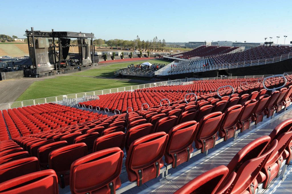 Splendid Red Chairs In Irvine Theatre Background