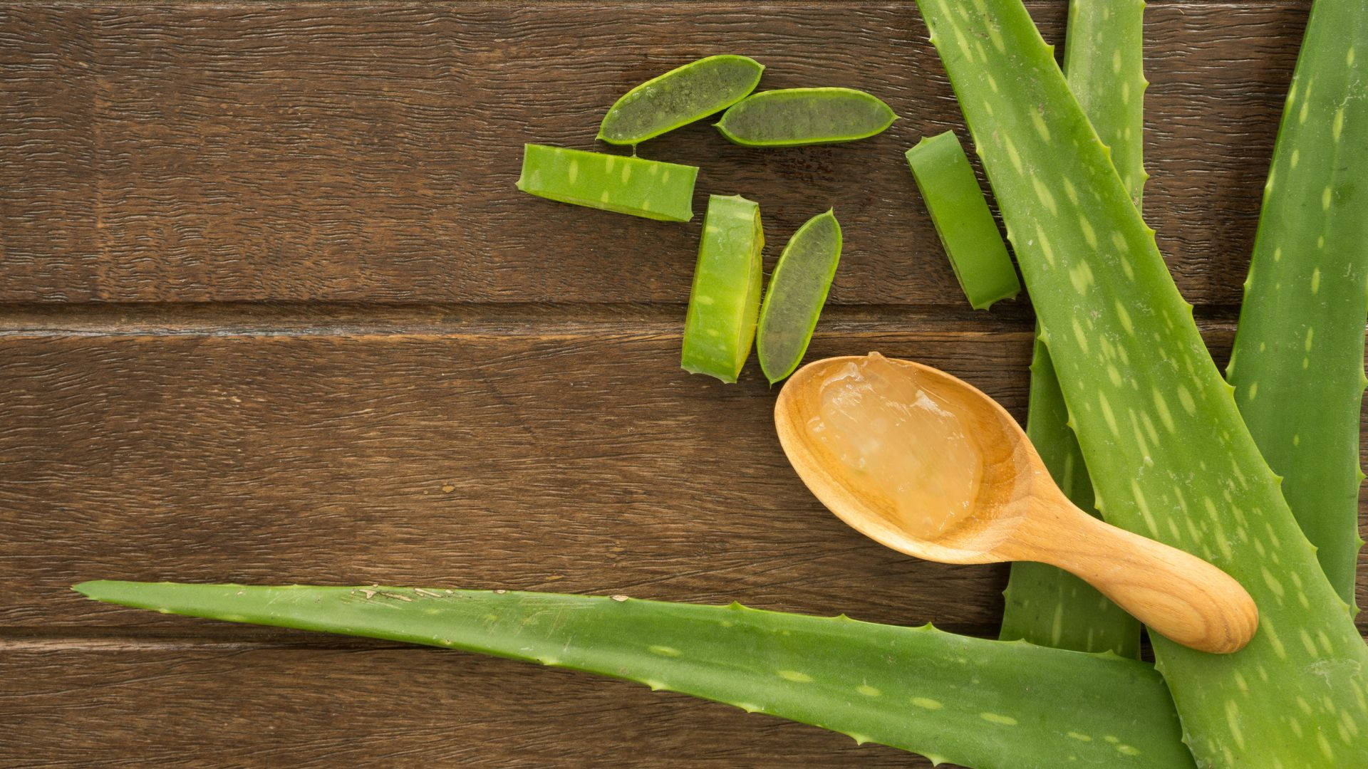 Spoon Of Aloe Vera Gel Background