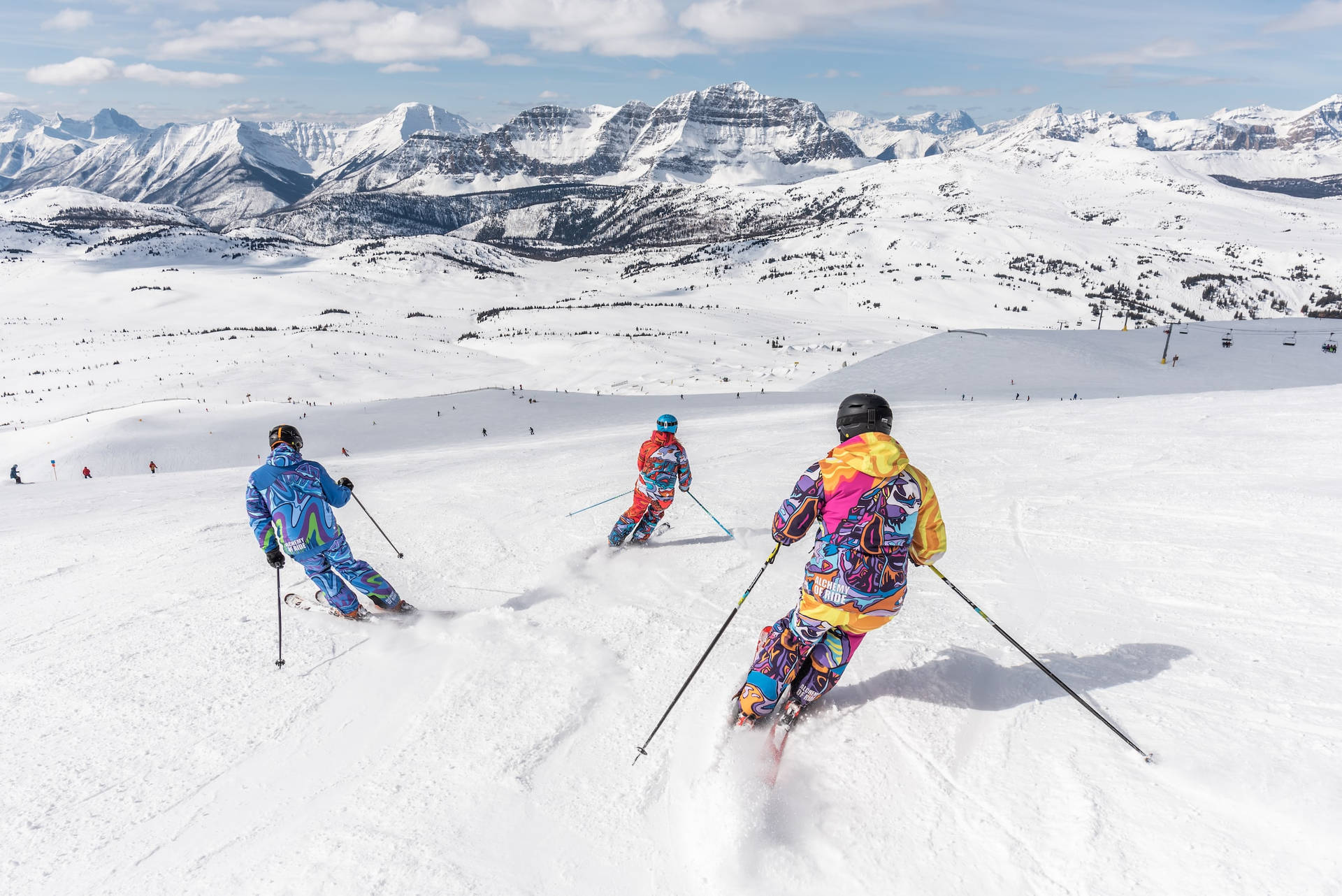 Sport Athletes Skiing Down A Mountain