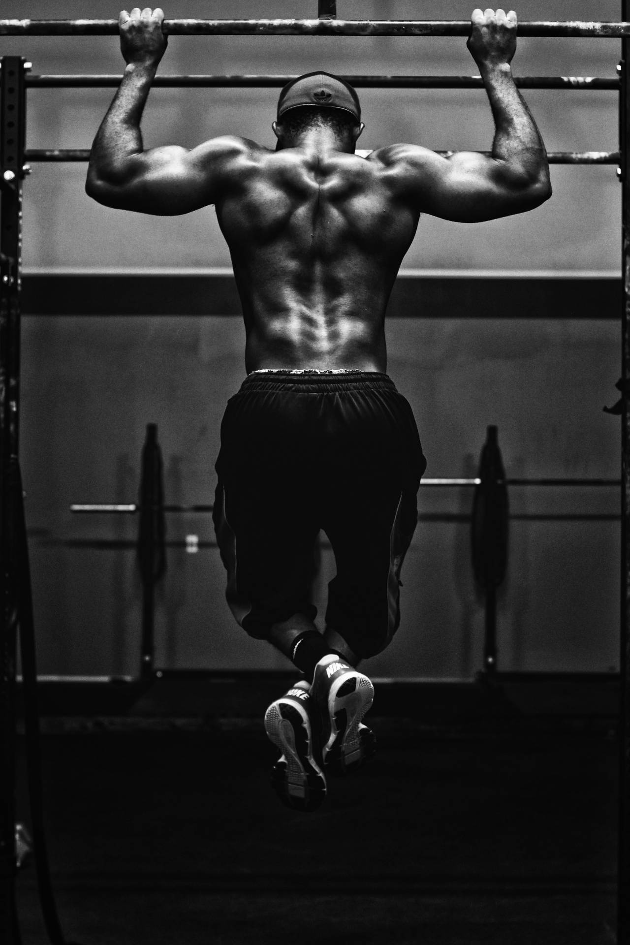 Sport Bodybuilder Doing Pull-ups Background