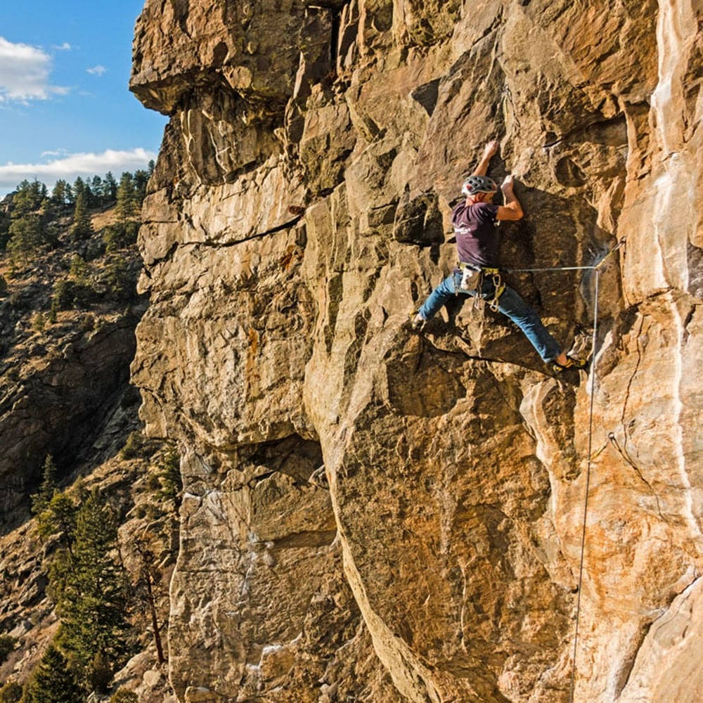 Sport Climbing On Rocky Cliff Background