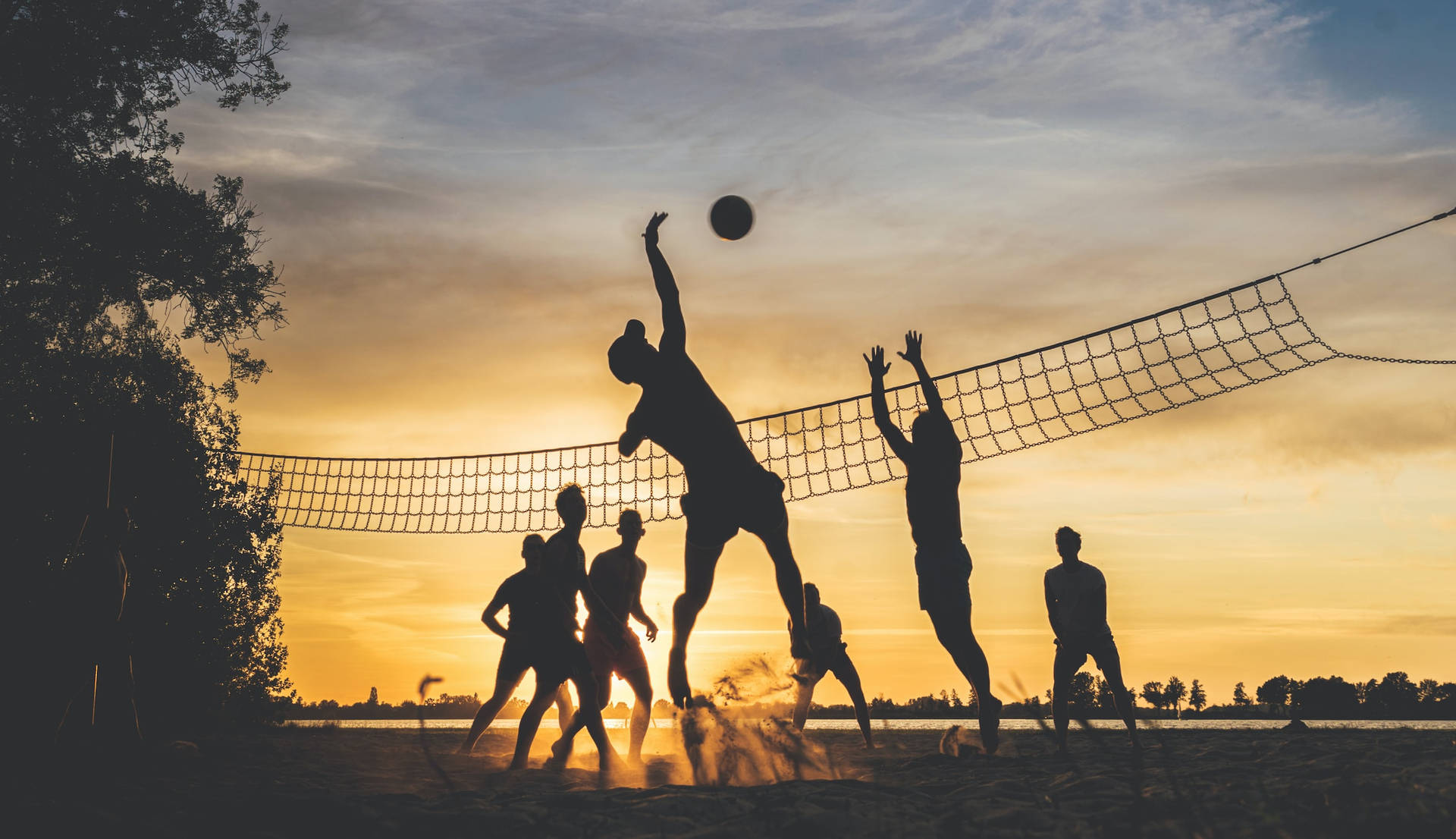 Sport Silhouettes Of Volleyball Players Background