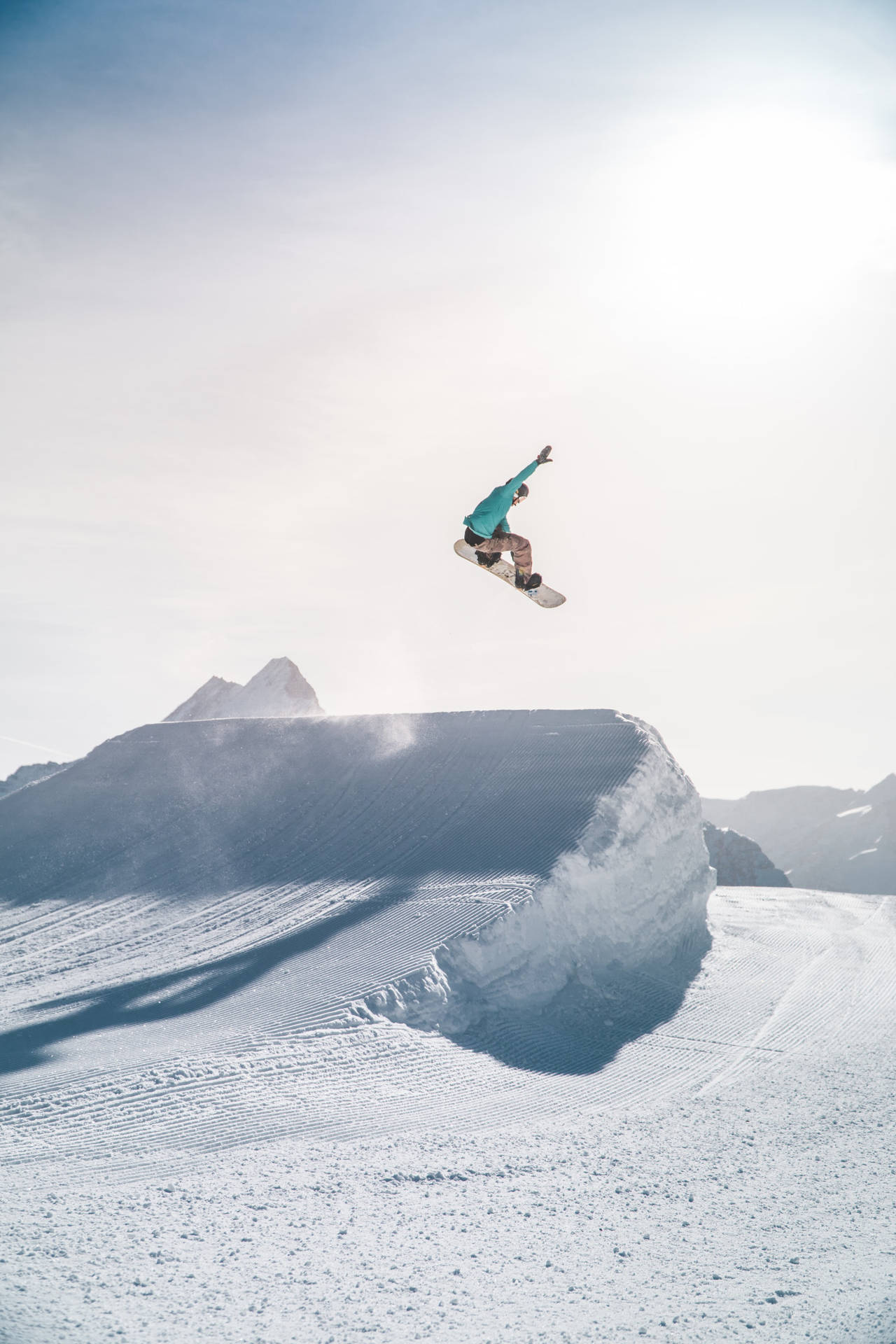 Sport Snowboarding In Snow-covered Mountain