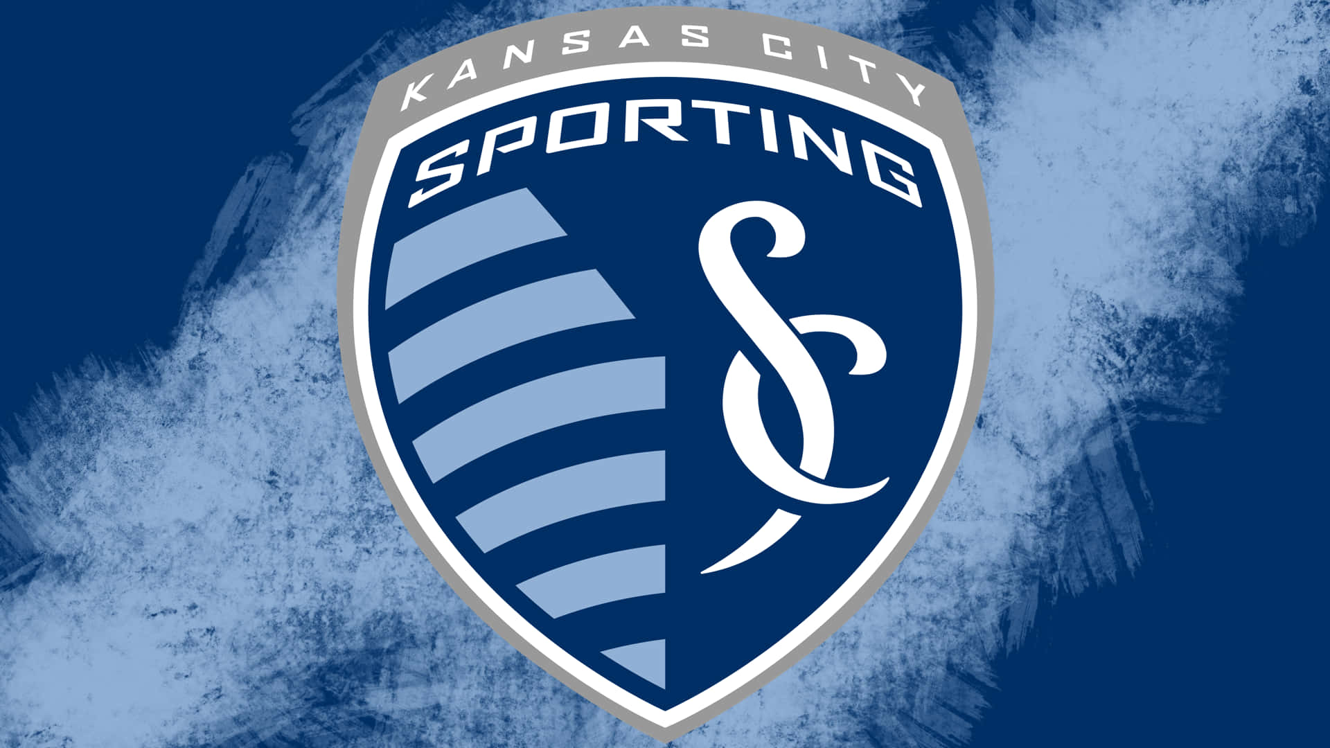 Sporting Kansas City Logo On Blue Backdrop Background