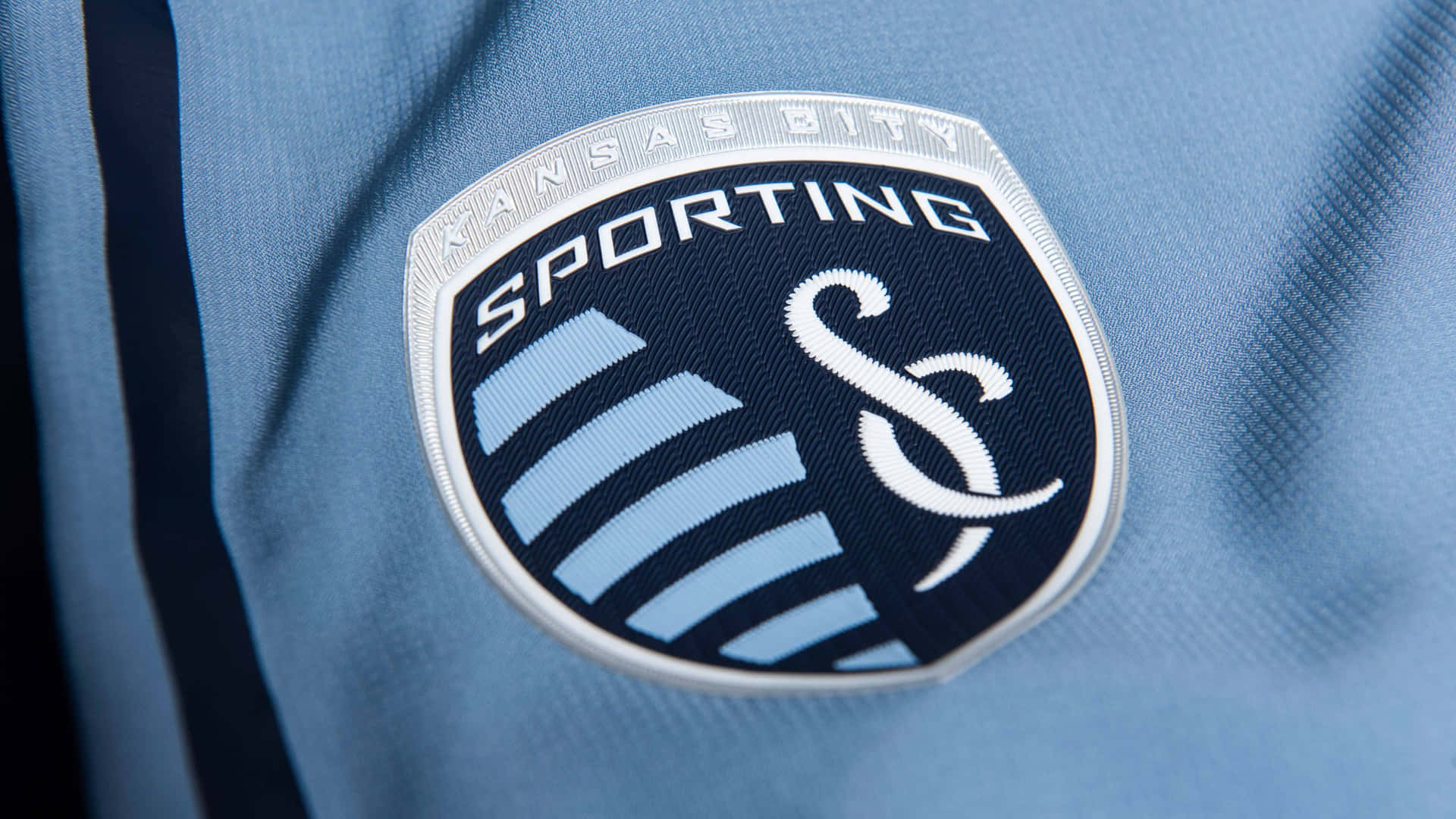 Sporting Kansas City Logo On Jersey Background