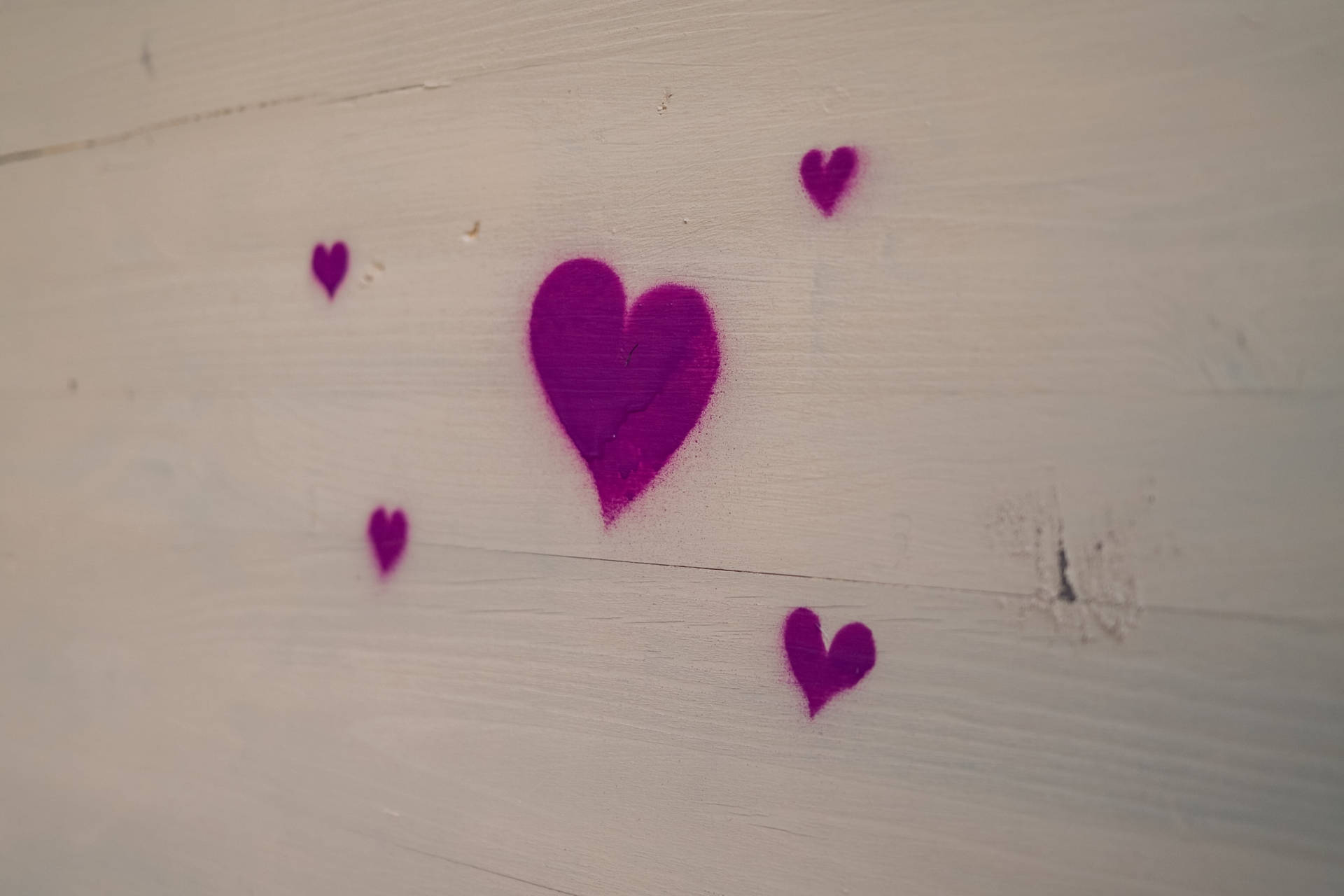 Spray Painted Purple Heart White Wooden Wall