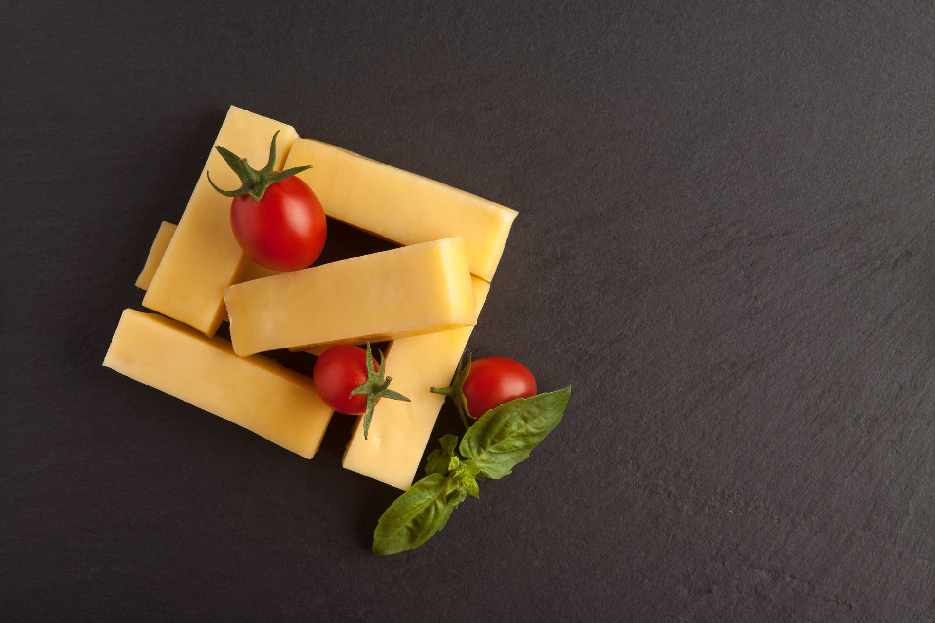 Square Cheese Blocks With Tomatoes Background
