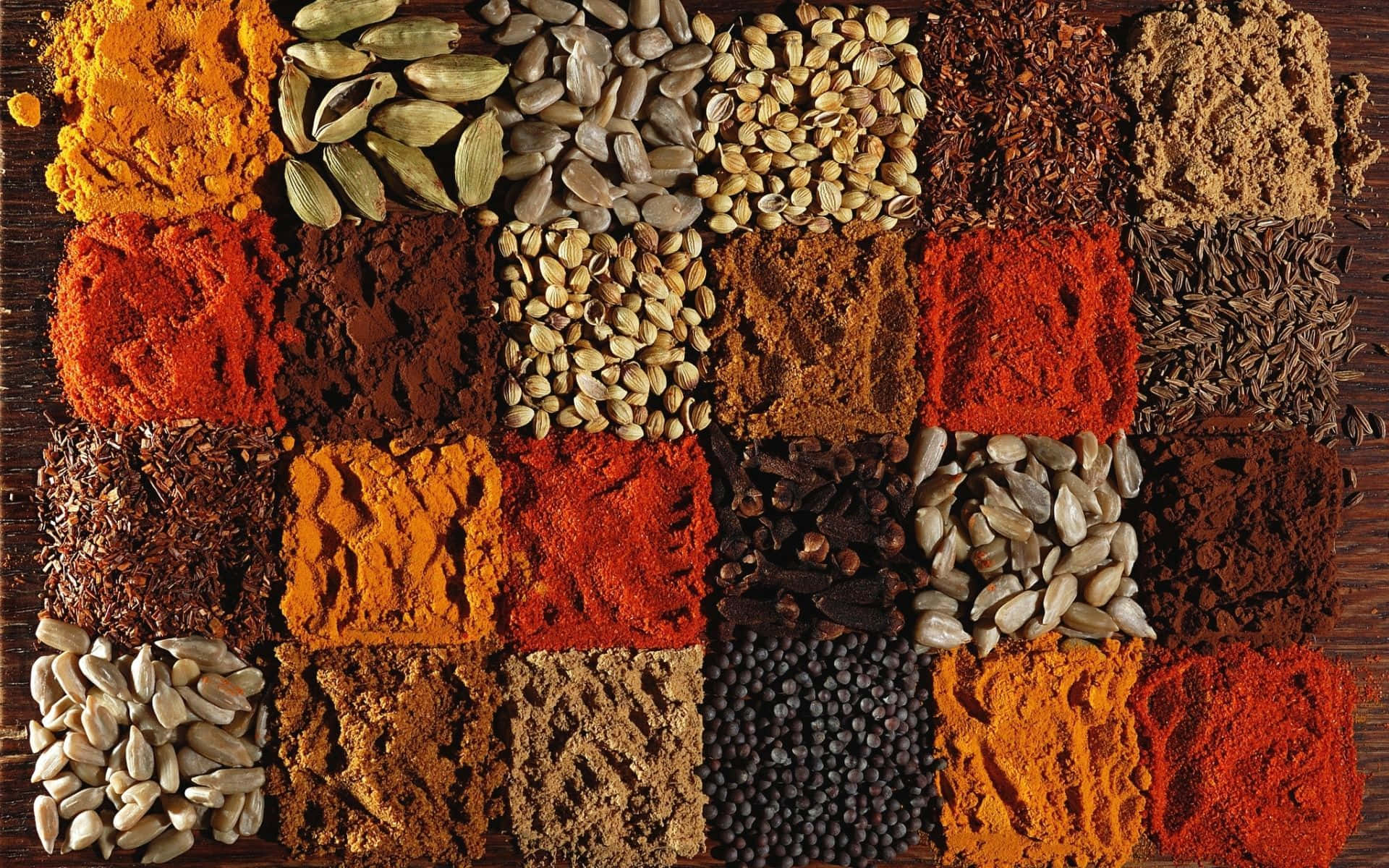 Square Shaped Spices On Wooden Surface Background