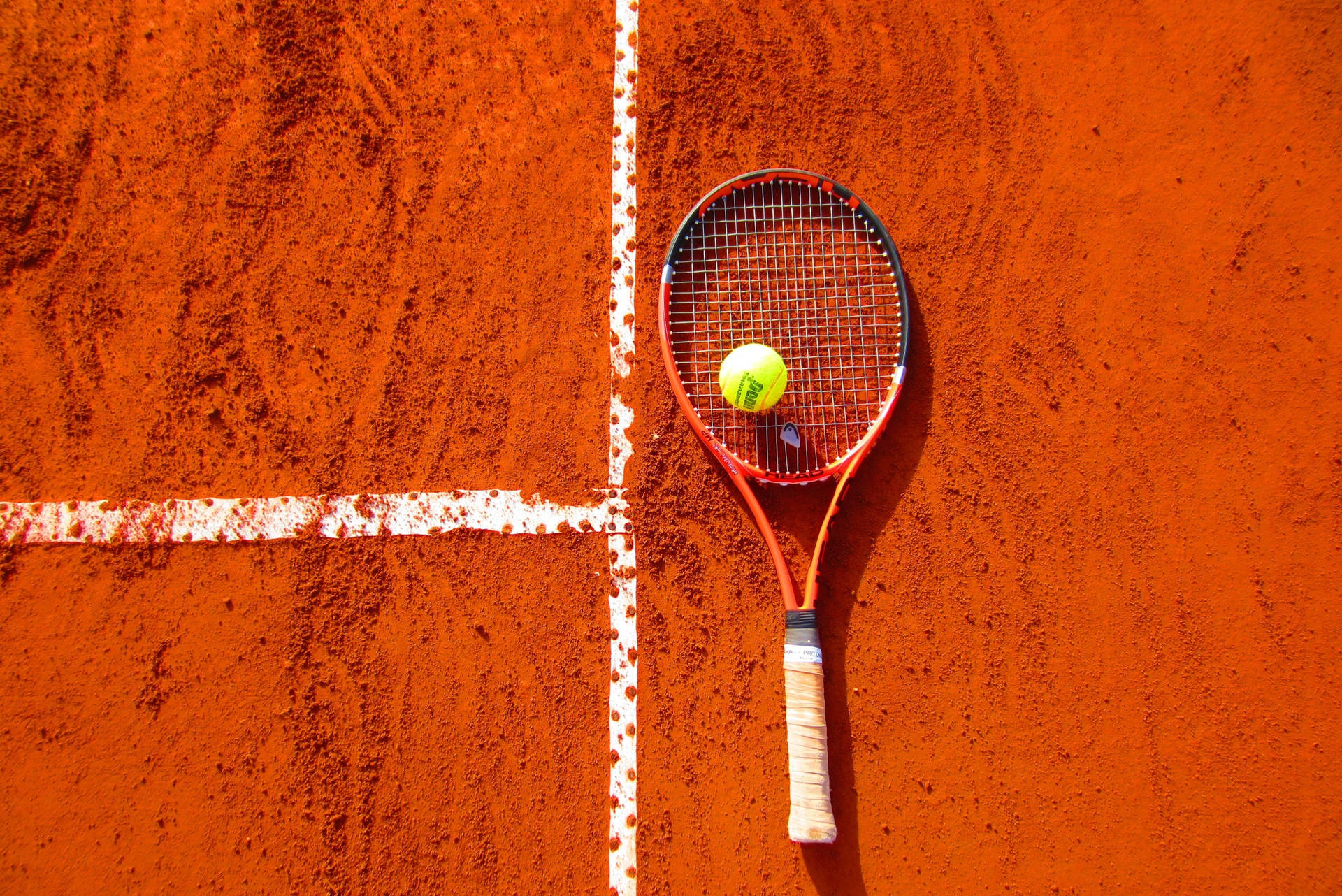 Squash Racket On Orange Floor